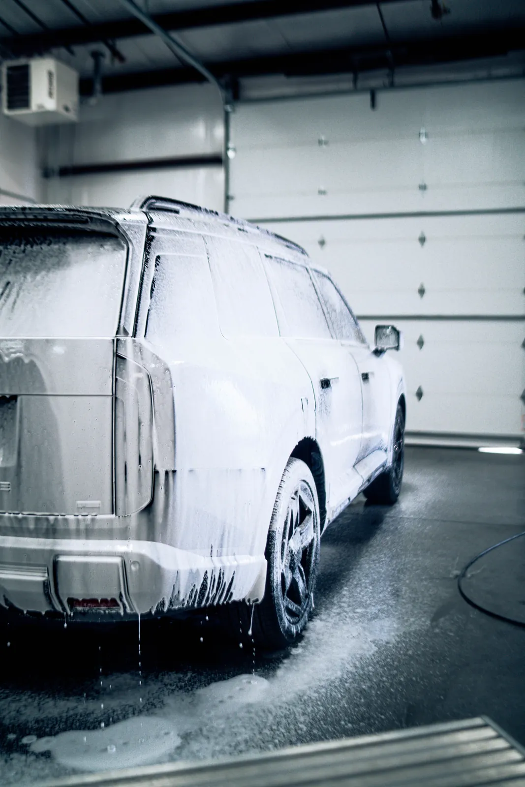 Washing a coated truck at 719 Auto Customs
